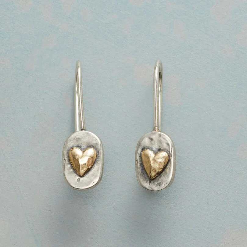 Heart-shaped silver and gold earrings